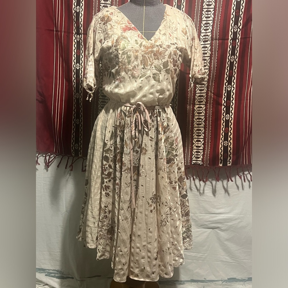 Asymmetrical vintage tan floral print dress with flare bottom